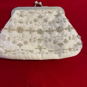 White beaded clutch bag